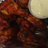 Chicken Wings · Spicy, seasoned or BBQ.