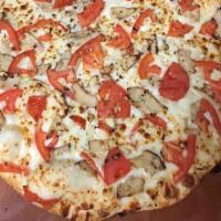 Chicken Garlic Pizza · Seasoned garlic chicken, onions, tomatoes, garlic, and creamy white sauce.