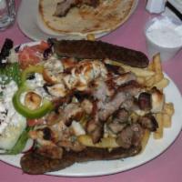 Special Combo Platter · Gyro, souvlaki and chicken kebob with Greek salad, french fries and pita bread.