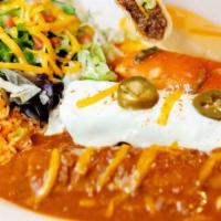 El Jefe · All your El Fenix favorites in one platter.  3 enchiladas (cheese with chile con queso, chic...