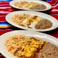 Enchiladas for 4 ·  (8 enchiladas total), served with salsa, refried beans, rice, guacamole, queso and chips to...