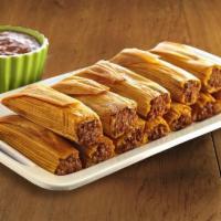 Tamale Family Pack · 8 Beef or Pork Tamales. Served with Rice, Refried Beans, Salsa, Queso, Guacamole and Chips