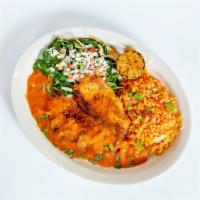 Tilapia Veracruz · Baked tilapia filet, topped with traditional ranchero sauce, served with sautéed spinach, ri...