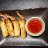 Fried Firecracker Shrimp Roll · 4 Shrimp, clear noodle and basil wrapped in roll skin