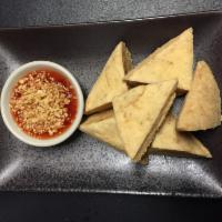 Fried Tofu · Bean curd served with chili sauce and crushed peanut. (Vegan Friendly)
