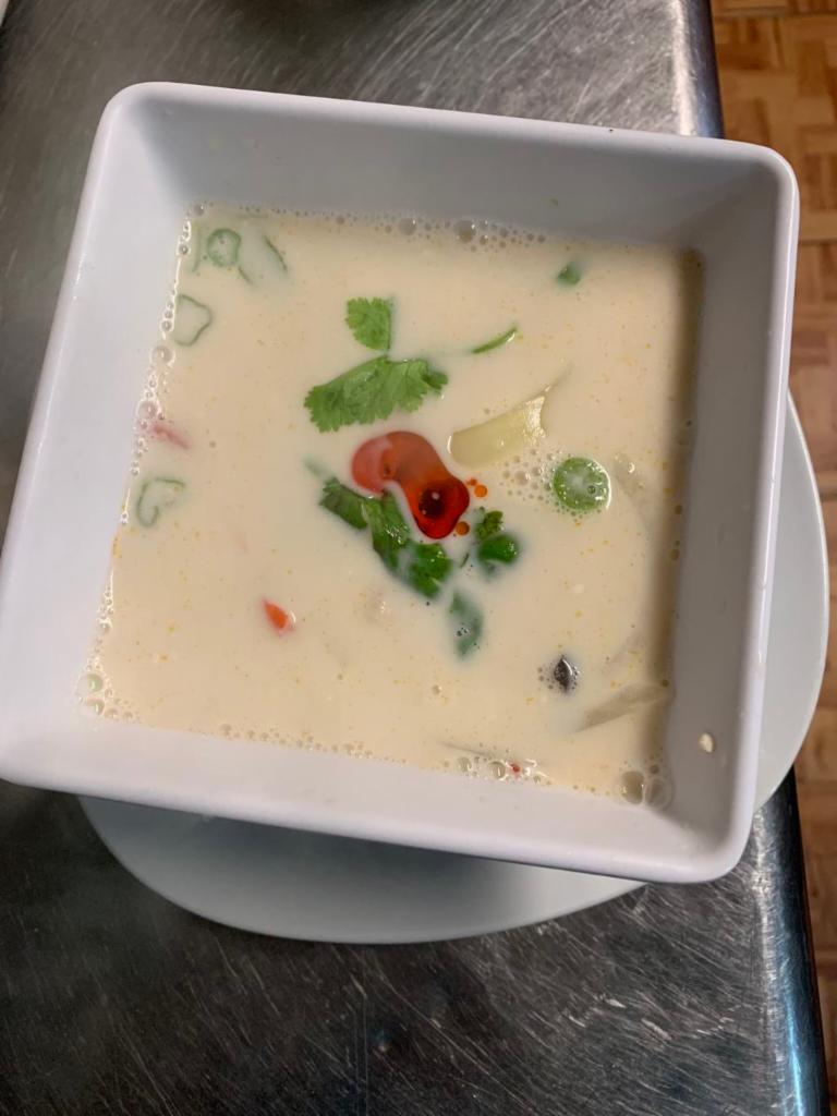 Small Tom Kha Soup · Coconut milk and fresh Thai herb. Mushroom, red onion and tomato.(plz ask for a vegan friendly)