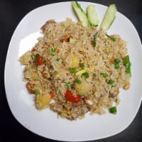 Pineapple Fried Rice · Chunk pineapple, onion, scallion, tomato, carrot and cashew nut. Includes egg.