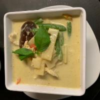 Green Curry · (Vegan Friendly) Coconut milk, bamboo shoot, pepper, eggplant and fresh basil. Served with w...