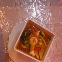 Jungle Curry · Broccoli, carrot, string beans, pepper, bamboo shoot and spicy curry paste. Served with whit...
