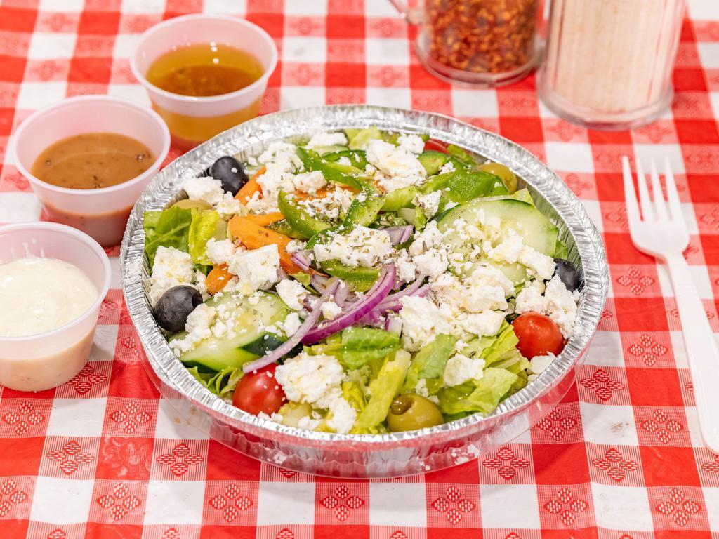 Greek Salad with Grilled Chicken · Tomatoes, cucumber, onion, and olives.