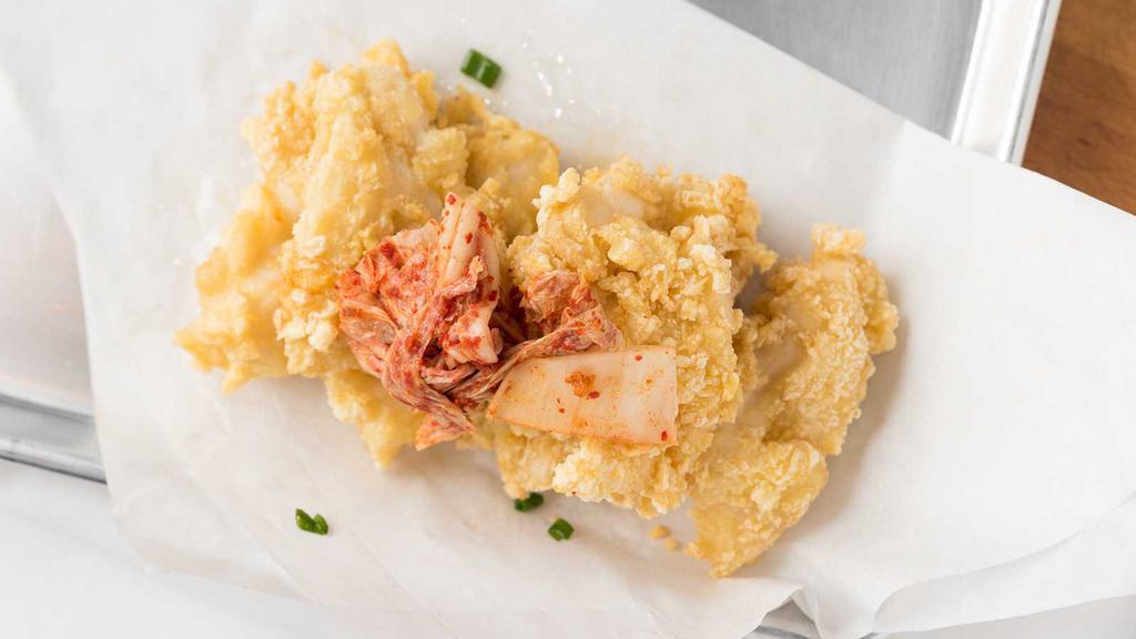 Kimchee Calamari · Squid. Mix of fermented vegetables.