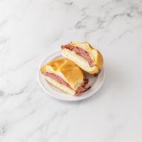 5. Parisian Delight Special · Hot corned beef, hot pastrami with melted provolone cheese, sauerkraut and Russian dressing.