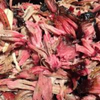 1 lb. Pulled Pork · Smoked pulled pork shoulder by the pound, including homemade pickles, sweet onions, jalapeno...