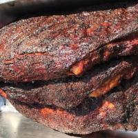 1 lb. Pork Spare Ribs · Pork spare ribs by the pound, smoked with a dry rub, includes homemade pickles, sweet onions...