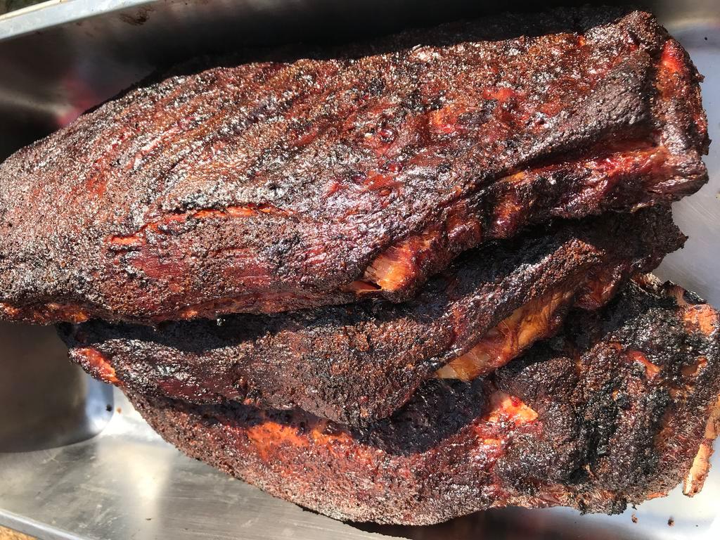 1 lb. Pork Spare Ribs · Pork spare ribs by the pound, smoked with a dry rub, includes homemade pickles, sweet onions, jalapenos, sauce and bread. We recommend at least 1/2 to 2/3 pounds of meat per person. Healthy appetites will eat more.