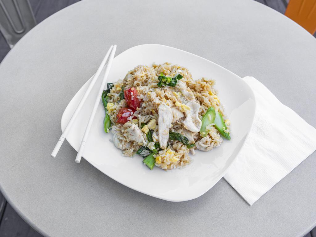 5. Kao Pad · Thai style fried rice with egg, broccoli, peas and carrots 