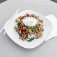 11. Pad Kra Pao Kai Dao · Ground chicken stir fried with Thai basil, Thai chili and garlic in brown sauce. On top with...