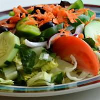 Tossed Salad · The salad that has been tossed with dressing.