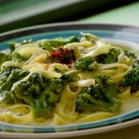 Fettuccine Alfredo with Broccoli · Flat thick pasta, broccoli with rich butter and Parmesan sauce.