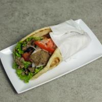 Beef and Lamb Shawarma Sandwich · Served with choice of bread, sauce and topping.