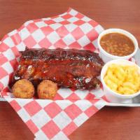1 1/2 Racks of Ribs · Served with 2 large sides.