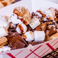 Toasted Smores · Topped with fluff, toasted marshmallows, Grahm cracker and chocolate.