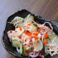 Spicy Kani Salad · 1/4 pound of kani crab salad seasoned with masago, cucumbers, and creamy sriracha.