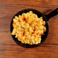Mac and Cheese · Macaroni prepared with freshly made cheese sauce, and bread crumbs.