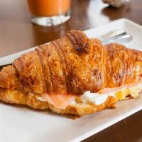 Salmon Breakfast Croissant · Freshly scrambled eggs, salmon and a slice of provolone cheese served on flaky and buttery c...
