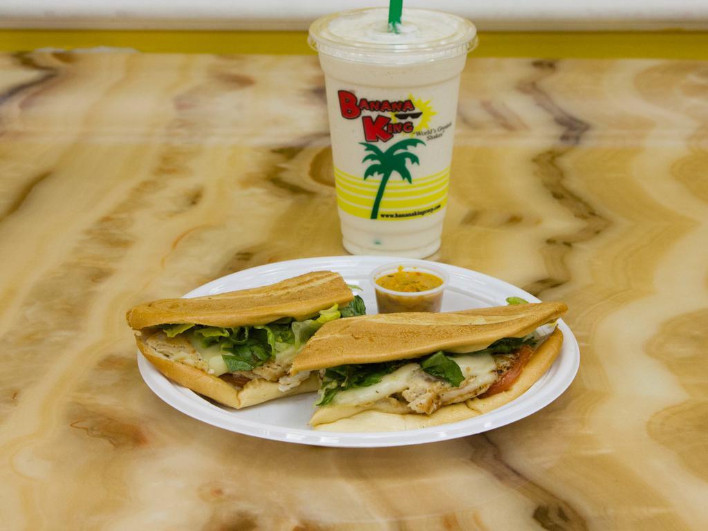 Chicken Sandwich Combo · Classic staple, toasted long bread sandwich with season grilled chicken filet, lettuce, diced onion, tomatoes, swiss cheese, mozzarella cheese, with mayo and pink sauce.

All Sandwich combos come your choice of 1 Regular Shake or Special Shake of the Week 