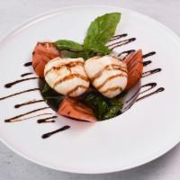 Heirloom Tomatoes Over Burrata Cold Salad Dinner · Served with balsamic reduction basil.