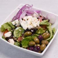Greek Cold Salad Dinner · Seasonal vegetables topped with feta cheese and olives.