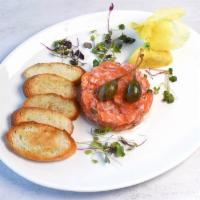 Salmon Tartare Dinner · Capers, olive oil, fresh squeezed lemon juice, shallots, scallions, and toast.