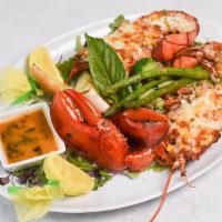 1.25 lb. Baked and Stuffed Lobster Dinner · Served with lemon garlic sauce and baguette.