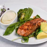 Atlantic Salmon Dinner · Grilled and glazed with creamy spinach and mashed potatoes.