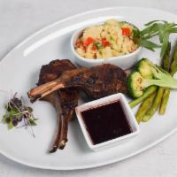 Rack of Lamb Dinner · Red wine rosemary sauce served with grilled vegetables.