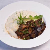 Porcini Risotto Dinner · With wild mushrooms.