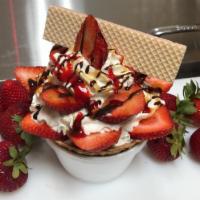 Queen De Fresa  · Two scoops of Ice Cream (your choice) served in a waffle blow, whipped cream, cookie and nat...