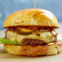 Burger Inc. · Daily ground Angus beef with American Cheese, caramelized onions, lettuce, tomatoes, pickles...