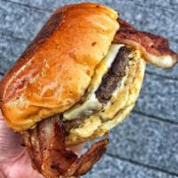$$$ Bacon (Bacon Burger) · Daily ground Angus beef with American Cheese, applewood smoked bacon, & house sauce on a bri...