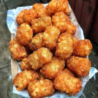 TNT · Tater tots with house seasoning.