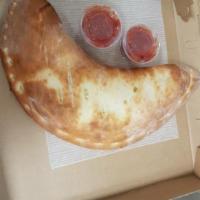 Meat Lovers Calzone · Pepperoni, sausage, meatballs, bacon, and ham.