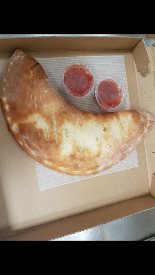 Meat Lovers Calzone · Pepperoni, sausage, meatballs, bacon, and ham.