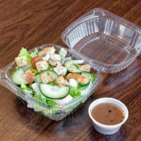 Garden Salad · Fresh lettuce, tomatoes, cucumbers, onions, peppers, and croutons.