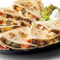 Chicken Quesadilla · Comes with chicken  grilled onions peppers mix cheese ..side mixed shepherd salad side salsa...