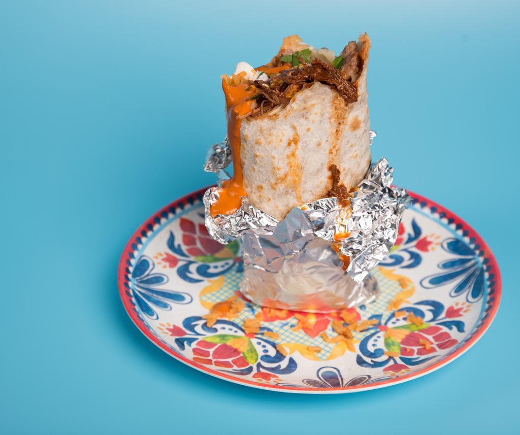 Super Burrito  · Regular burrito with choice of meat, grilled cheese, sour cream, and avocado.