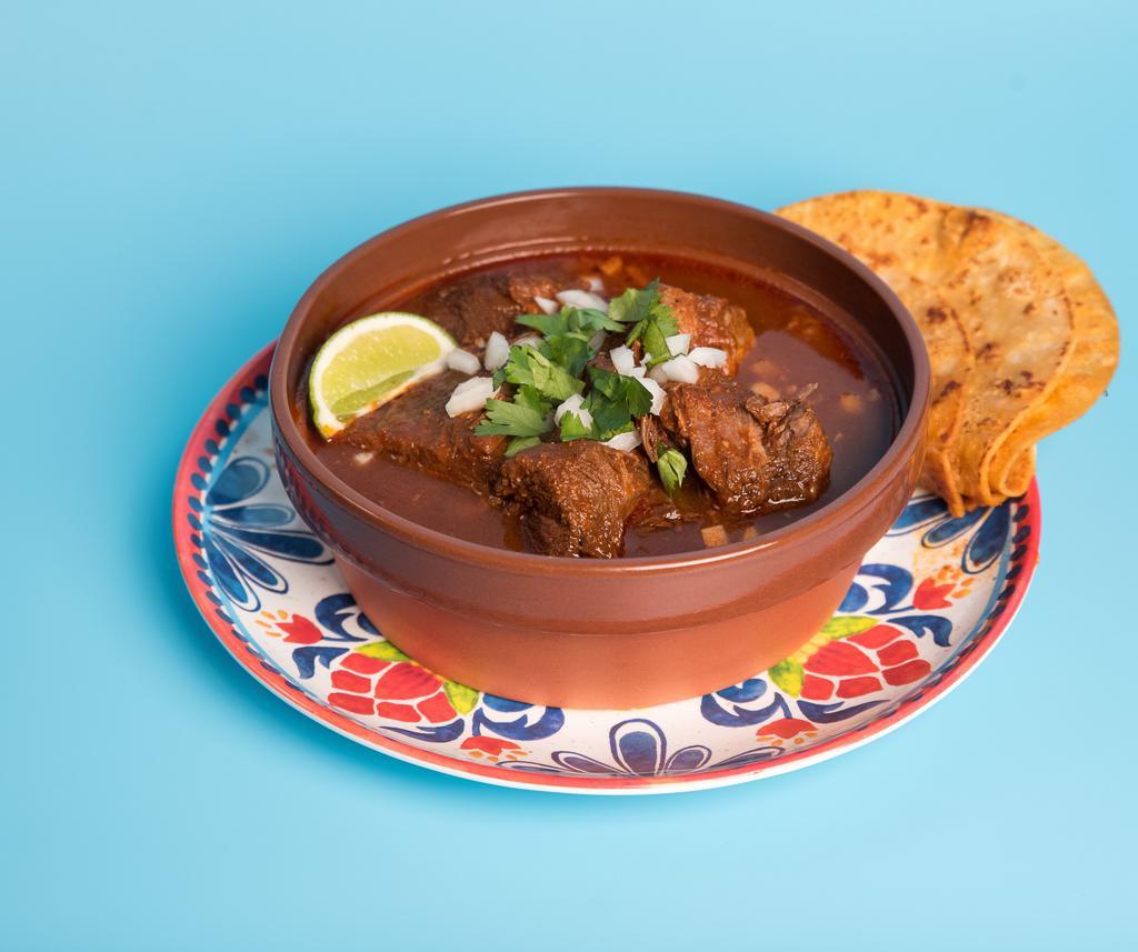 Traditional Birria Bowl · Halal beef birria served in its savory broth with onions, cilantro, and tortillas.