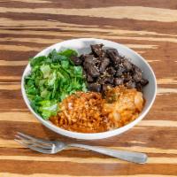 Korean BBQ · Grilled boneless beef short ribs, Kimchi, romaine lettuce, seasoned rice, and salsa Roja. 