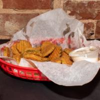 Fried Pickles · A generous portion of slightly breaded pickle chips, deep fried, and served with ranch.
