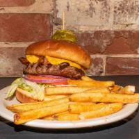 Kevin Bacon Burger · 8 oz. charbroiled burger topped with smoky bacon, choice of cheese, lettuce, tomato and onio...